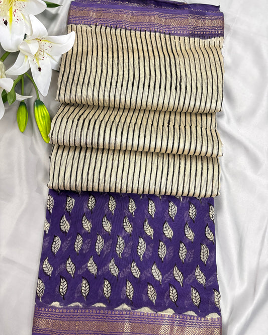 Office wear saree with purple and white patterns on a white background