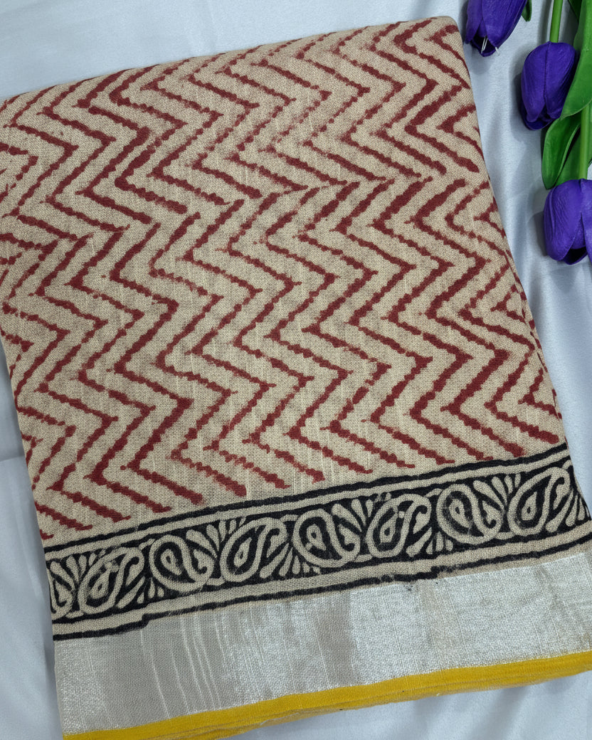 Shuchi Label Linen Saree with red chevron pattern on a white background