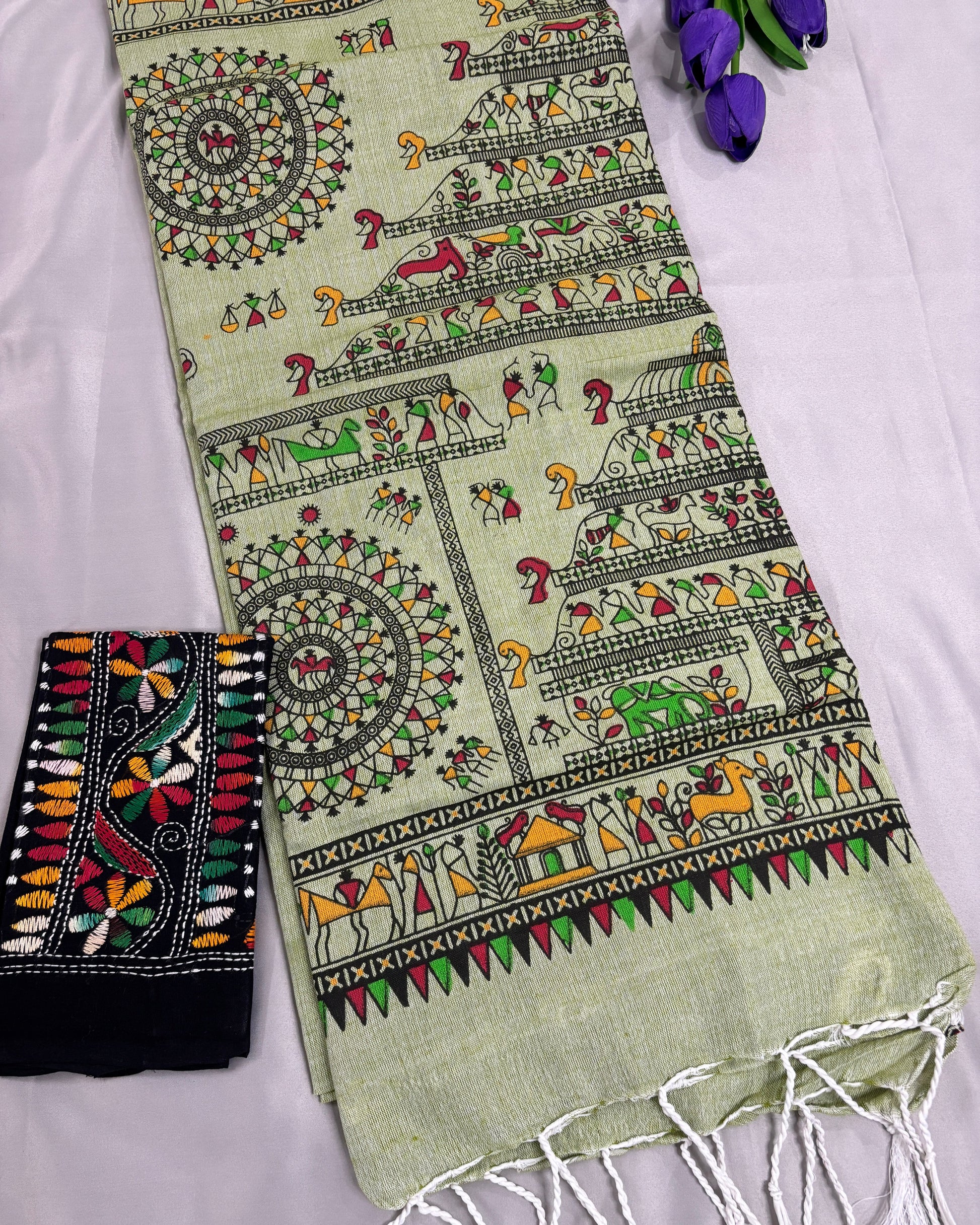 Khadi Cotton saree with intricate patterns on a light green background