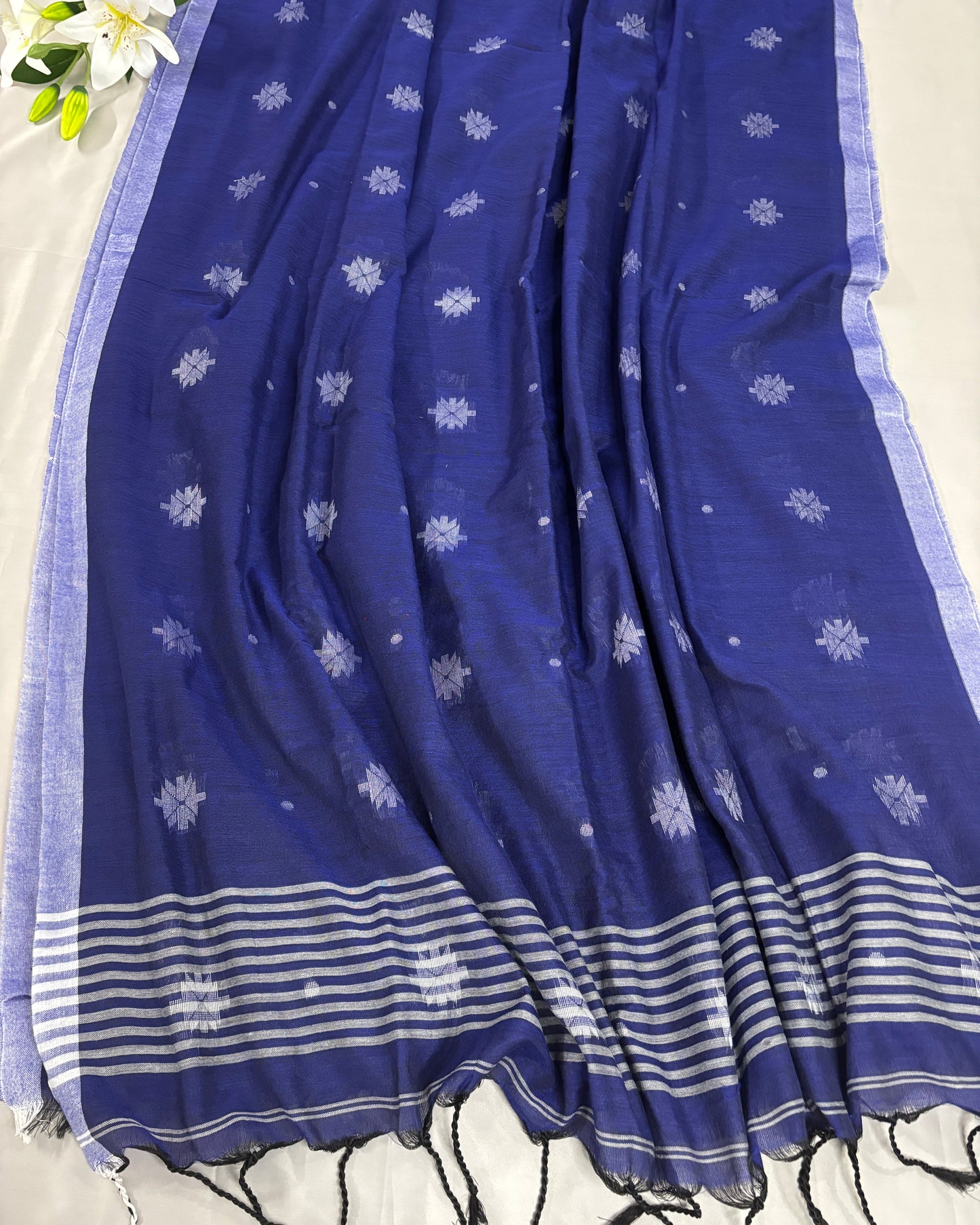 Blue pure soft cotton with white patterns and stripes on a light background