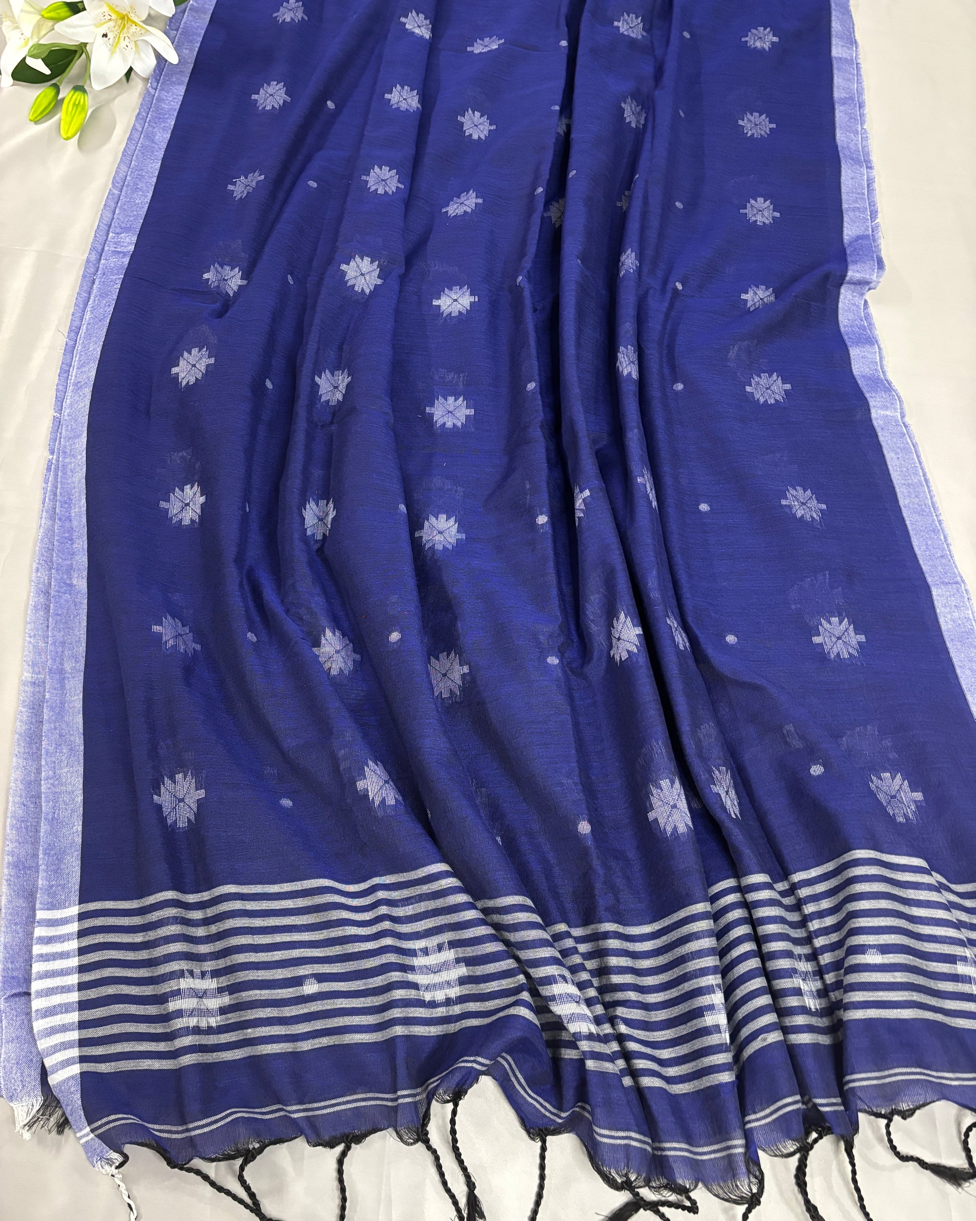Blue pure soft cotton with white patterns and stripes on a light background