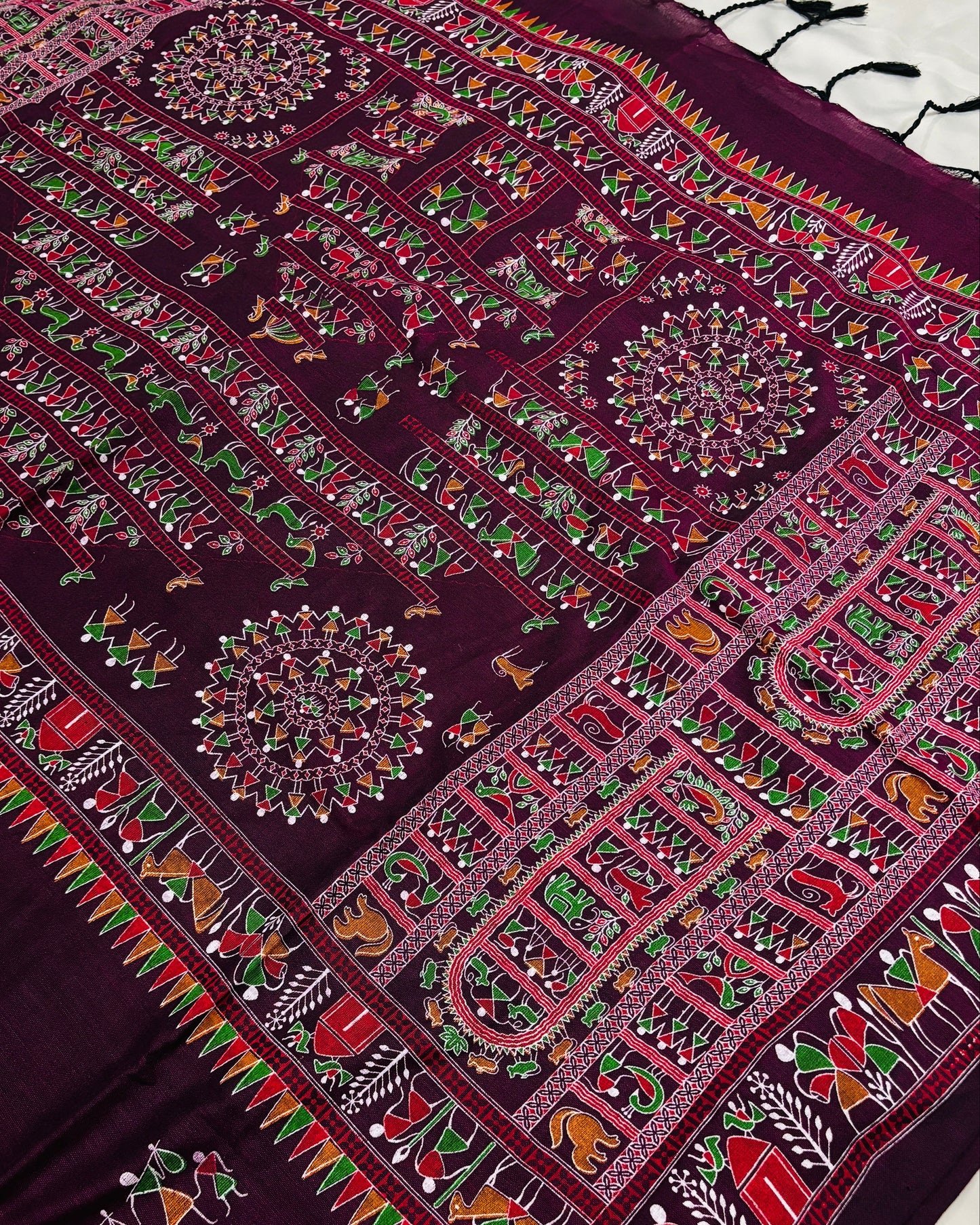 Madhubani printed purple Shuchi Label saree on a white background